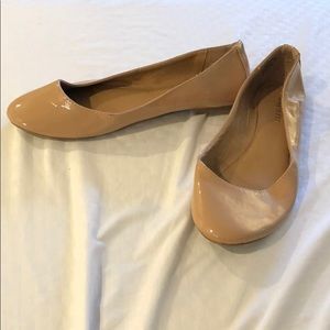 Nude patent leather flats